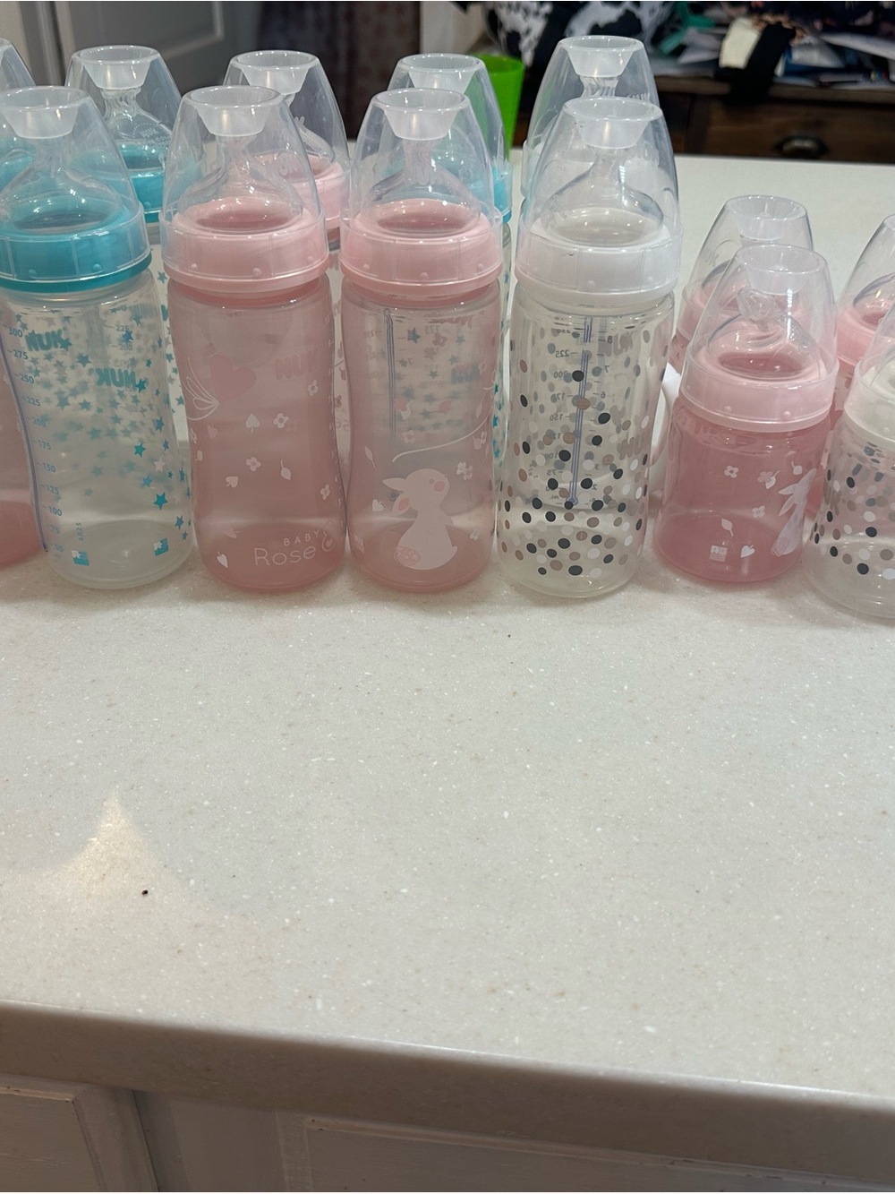Nuk Assorted Baby Bottles - Pink, Blue, Clear Designs- 2 replacement nipples